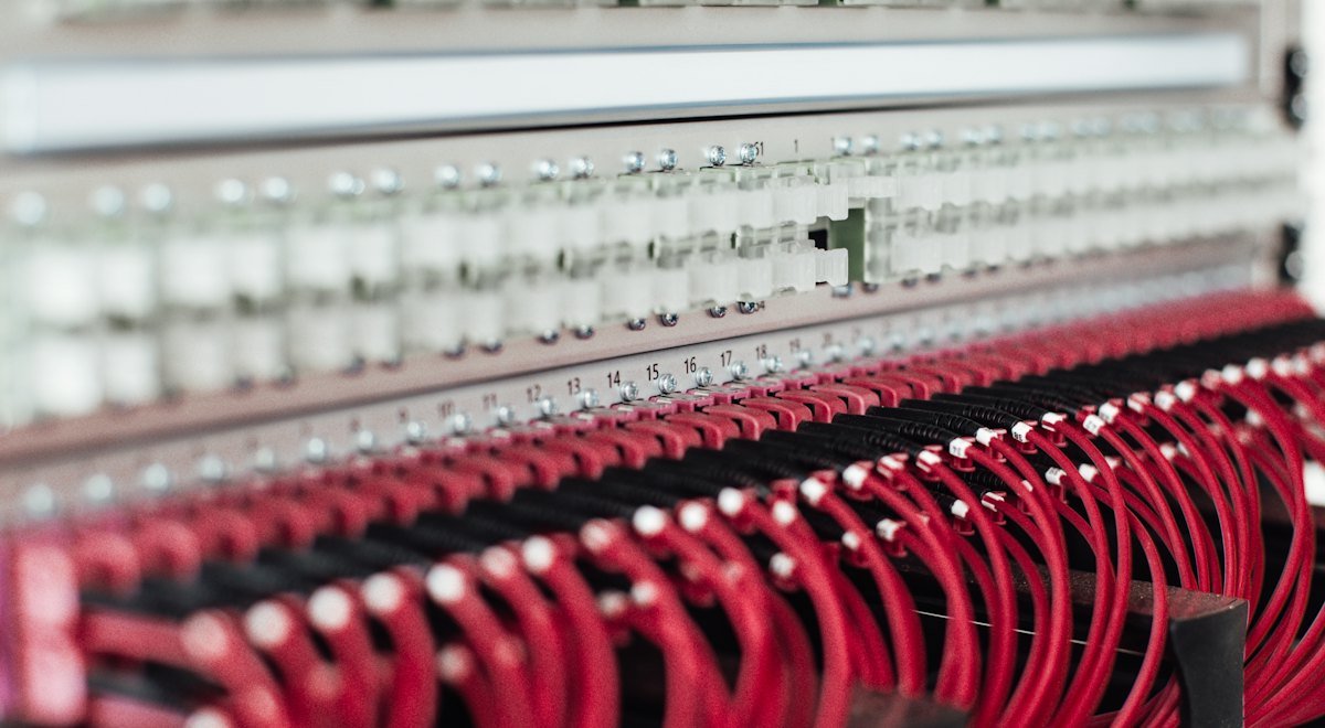 Network switch with neatly run red patch cables